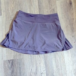 LULULEMON OFF THE PLEATS PURPLE SKIRT SIZE 2 NWOT